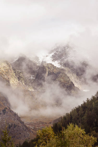 istock Cloudy dramatic French Alps mountains landscape 1459343826