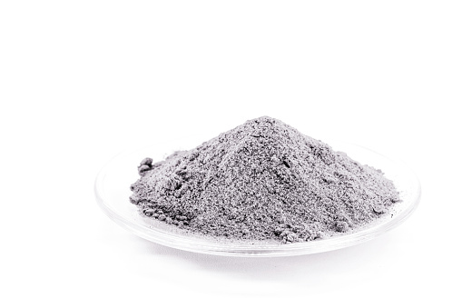 aluminum oxide or alumina, chemical compound of aluminum and oxygen, used in blasting to remove excess calcined coating and in parts made of metal.