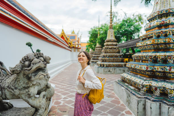 istock Woman exploring  Wat Pho in Bangkok 1459346875