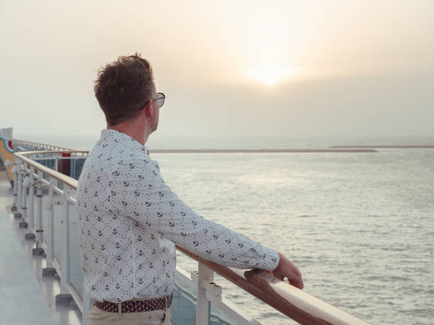 istock Fashionable man standing on the empty deck 1459349456