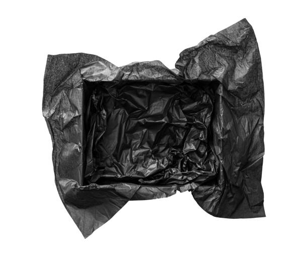 istock Top view of empty open gift box with black color silk paper filling inside. Luxury present wrapping or products background. Isolated on white, studio shot. 1459351062
