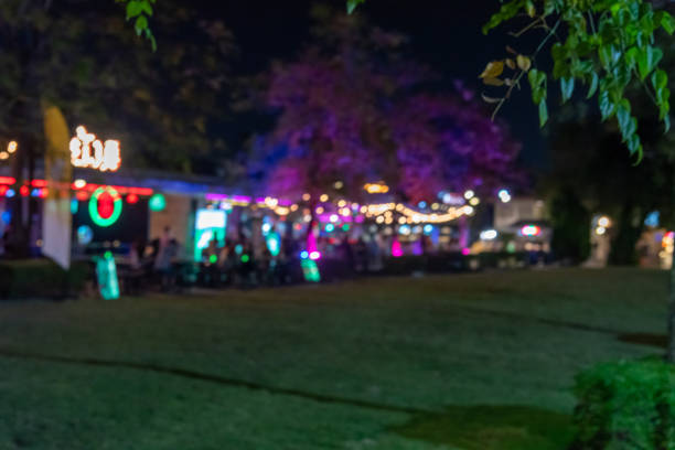 istock Blurred people eat at restaurants outside. For a background image 1459360437