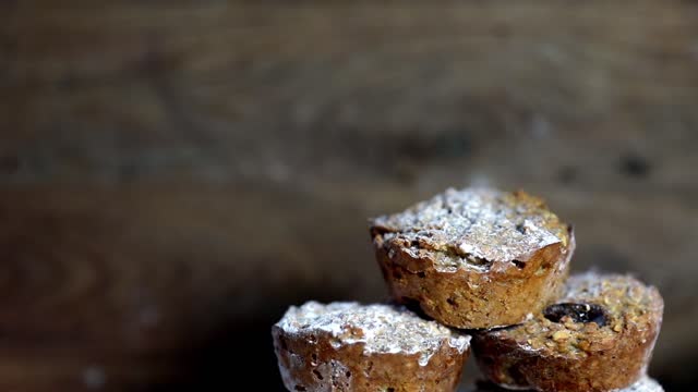 Fresh muffins banana with wooden background shallow focus turning and copy space. healthy bread banana cupcakes