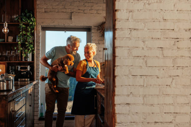 istock Senior family in kitchen. 1459361384