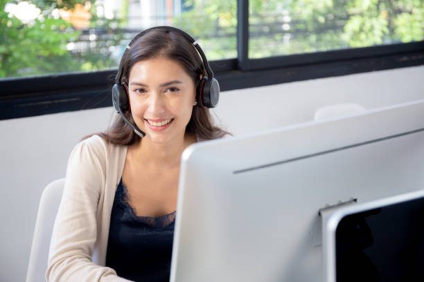 istock Customer service with friendly, businesswoman is call center and operator for support client, assistance and consultant, adviser helpdesk and contact, woman wearing headset, business concept. 1459362631