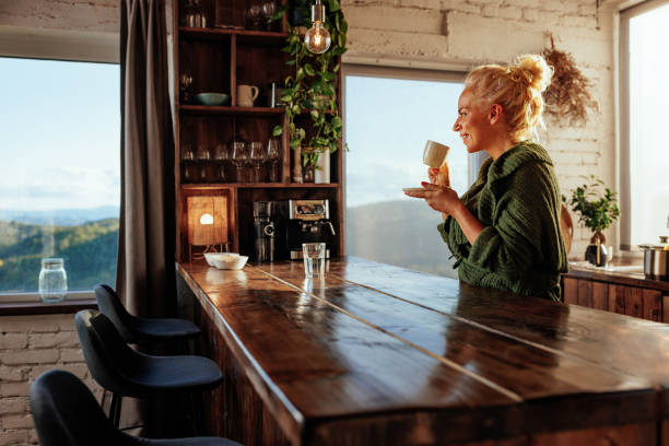 istock Mature woman drinking coffee at home. 1459362662