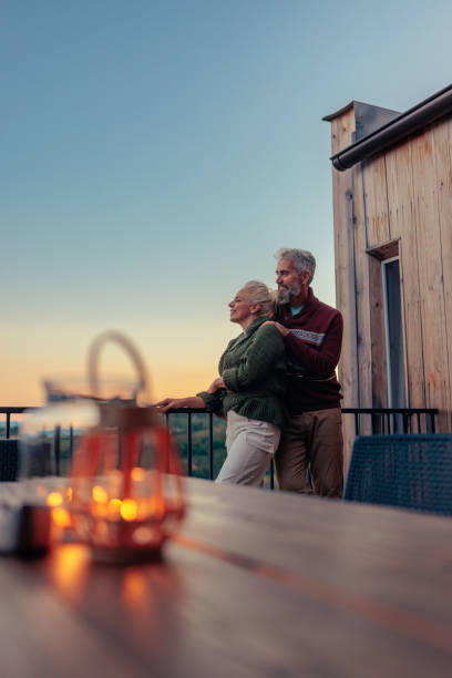 istock Senior couple enjoying at mountain house. 1459362810
