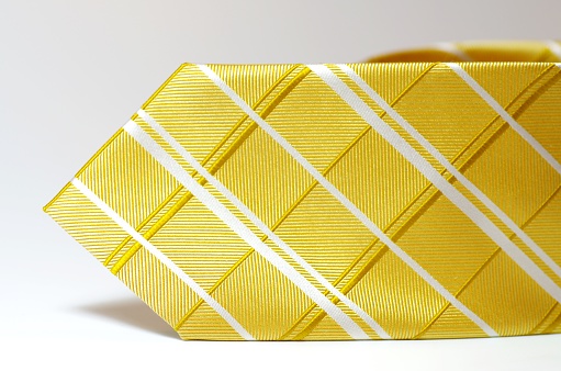 Yellow golden tie close-up