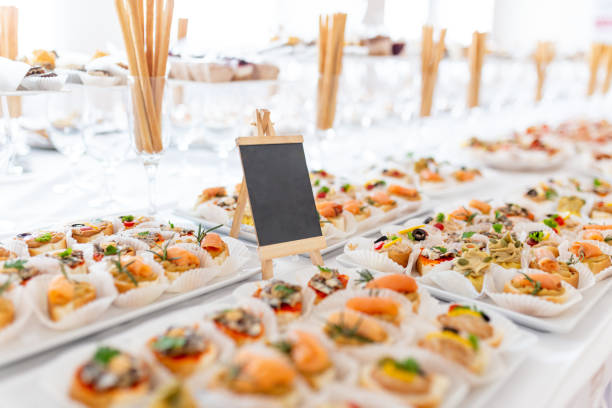 istock Fresh appetizers on plates. Food and event concept. Copy space. 1459364818