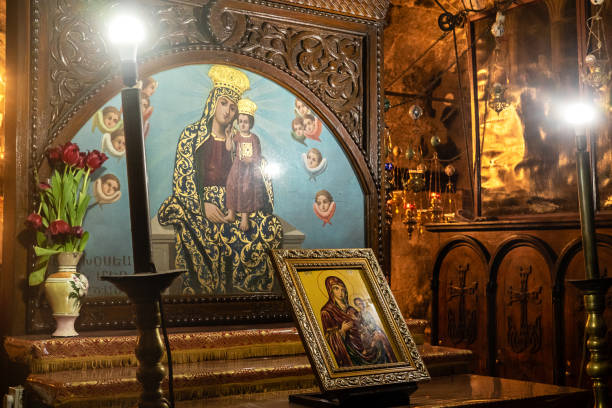 14 January 2023, Jerusalem, Israel: Church of Burial of Virgin Mary in Jerusalem 14 January 2023, Jerusalem, Israel: Church of Burial of Virgin Mary in Jerusalem. Wall icons, arch of temple in frescoes. tomb of the virgin mary in jerusalem stock pictures, royalty-free photos & images