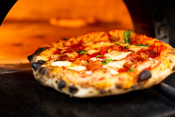 istock Preparing delicious Italian traditional pizza. 1459365263