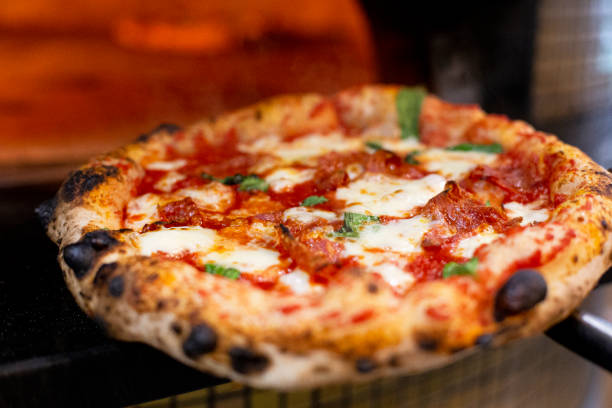 istock Preparing delicious Italian traditional pizza. 1459365520