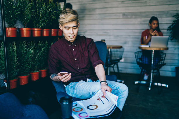 istock Asian man working with diagrams in workspace 1459374238