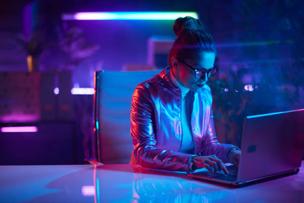modern woman in glasses with laptop stock photo