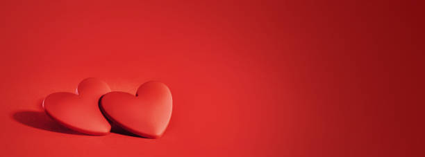 istock two red hearts for St Valentines day 14 February. 1459381454