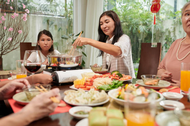 istock Family Eating Dinner at Home 1459383471