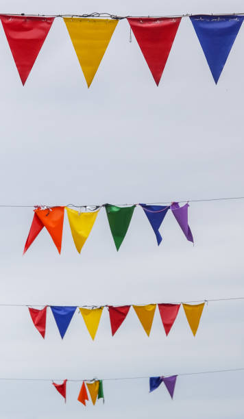 istock Low angle view of flags against sky 1459385840