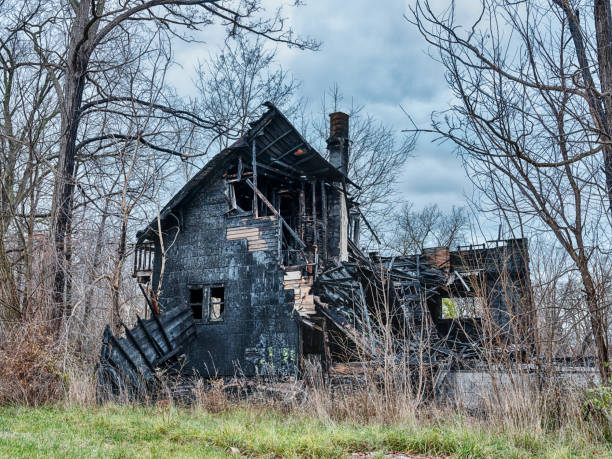 Burned Out House Remains The burned out remains of a house in Highland Park wait to be torn down. highland park michigan stock pictures, royalty-free photos & images