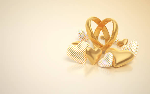 istock Gold Wedding Rings and Heart Ornaments 1459388301