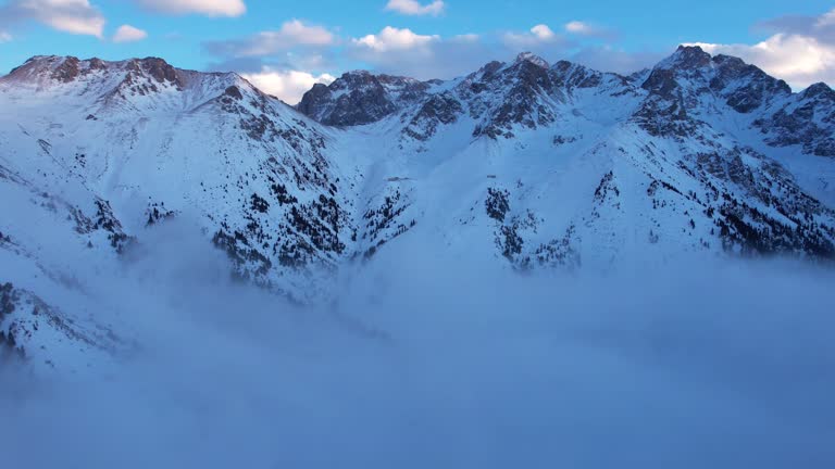 Flying among the ocean of clouds in the mountains