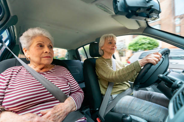 istock Active senior women going for a ride in the car 1459391090