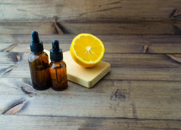 istock Glass vials and lemon on the table. 1459391812