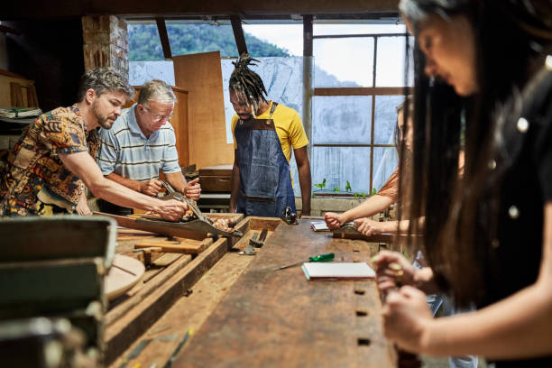 istock Multiracial group of people in a woodwork class 1459392596
