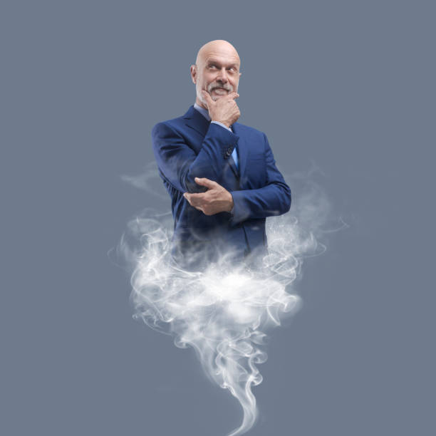 istock Genie businessman appearing with smoke 1459393400