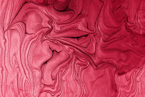 Liquid shimmer background,monochrome red trendy color of 2023.