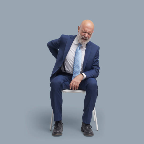 istock Frustrated businessman with back pain 1459395344