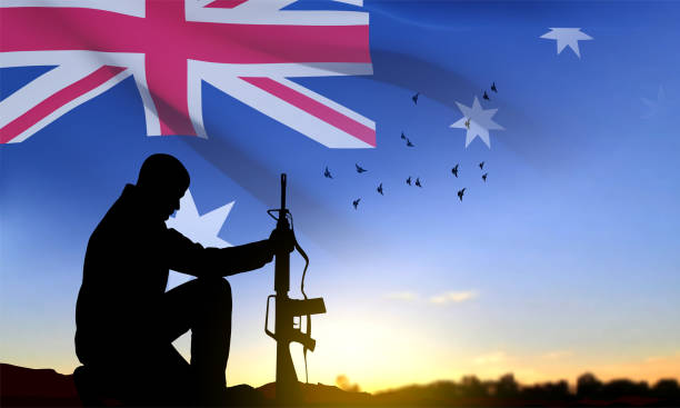 istock Silhouette of Soldier kneeling down with Australian flag 1459396850