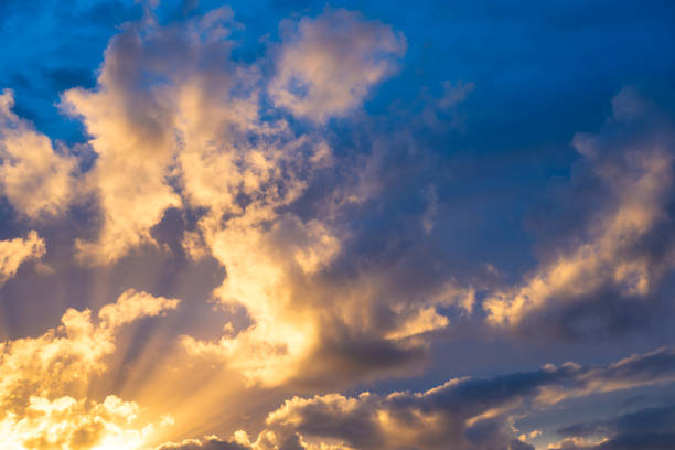 Sky with clouds during sunset. Clouds and blue sky. A high-resolution photograph. Panoramic photo for design and background.
