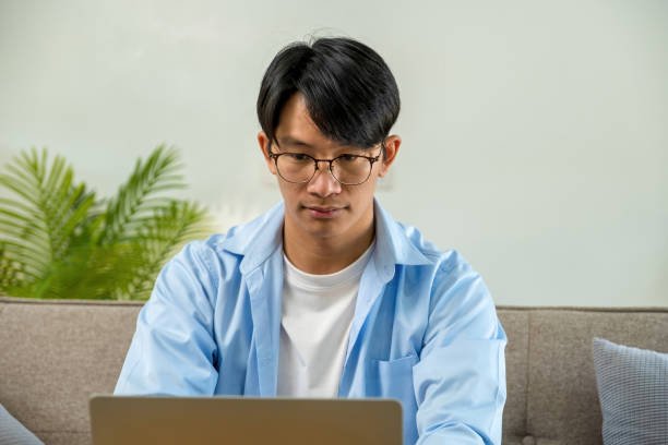 istock Happy cheerful businessman in home office. 1459400377