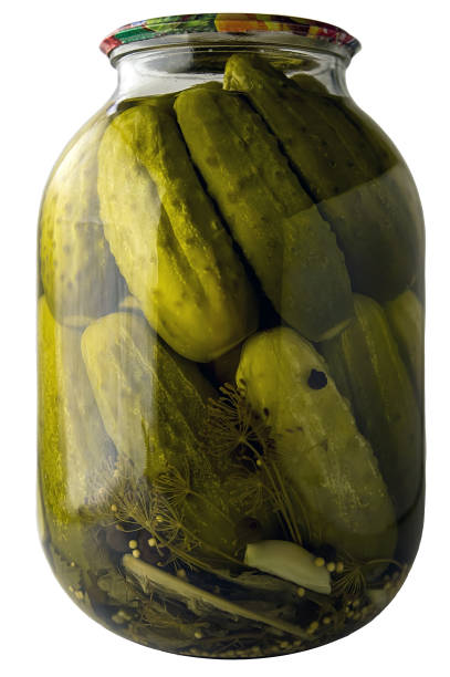 istock Pickled cucumbers in a jar. Isolated image 1459402233