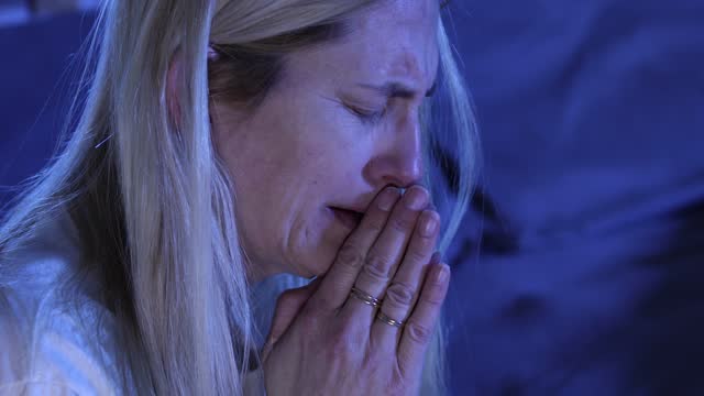 Woman Praying and Crying