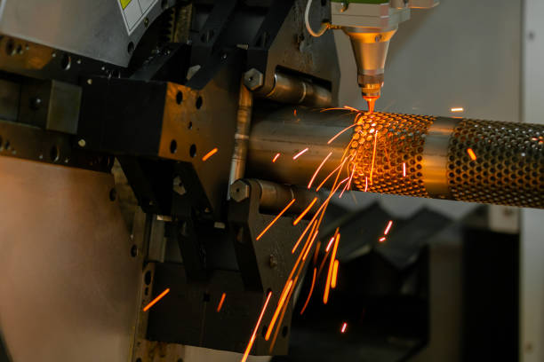 istock Laser cutting machine working with metal workpiece with sparks 1459406264