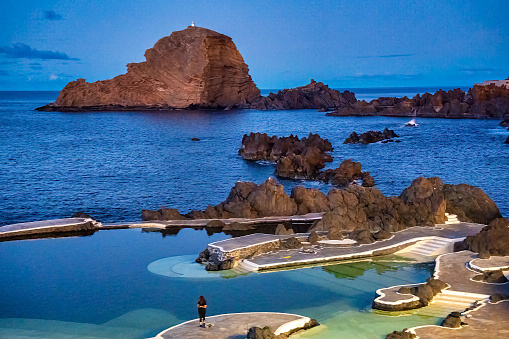 Sunset view of natural lava pools at night in Porto Moniz.