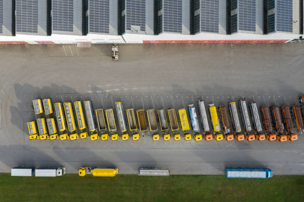 istock Aerial View of Trucks Loading at Logistic Center, Distribution Warehouse 1459422389