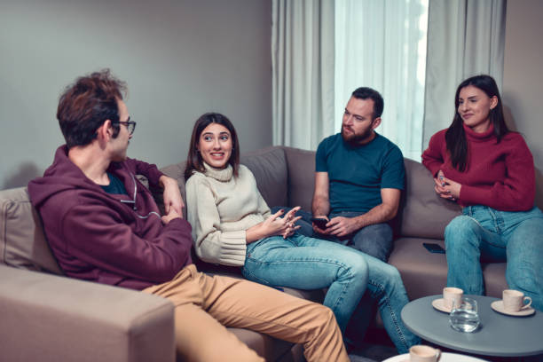 istock Home Hangout Time For Smiling Friends 1459422898