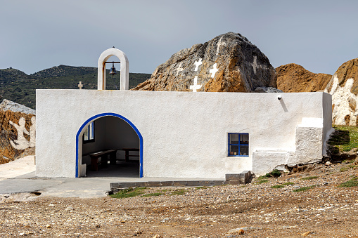 Old, Christian, Orthodox, small, white church near the sea on the waterfront (Greece)