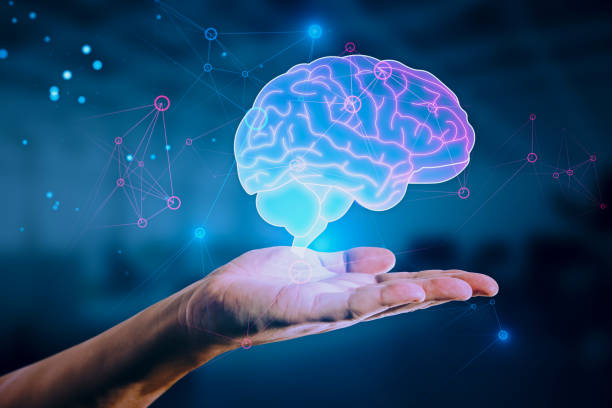 istock Close up of hand holding glowing human brain hologram on blurry background. Artificial intelligence, neurology, technology and future concept. 1459438049