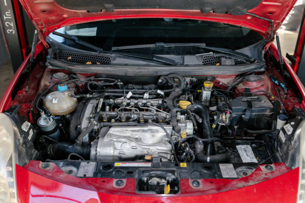 istock Car hood opened in a garage 1459441917