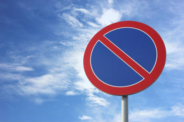 istock Traffic sign No Parking against blue sky, space for text 1459443561
