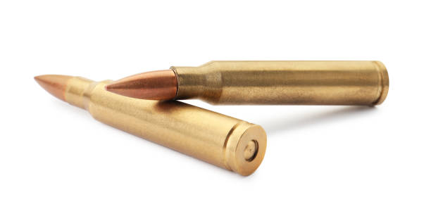 istock Two bullets on white background. Military ammunition 1459443665
