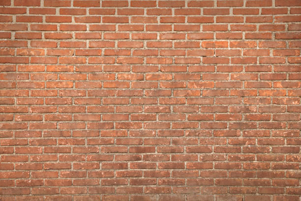 istock Texture of red brick wall as background 1459443725