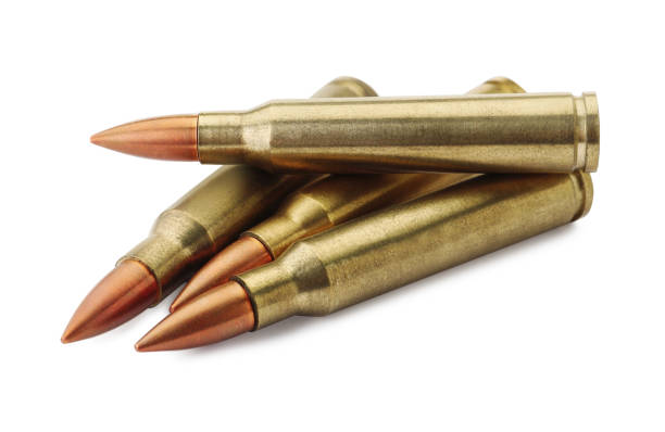 istock Many bullets on white background. Military ammunition 1459443795