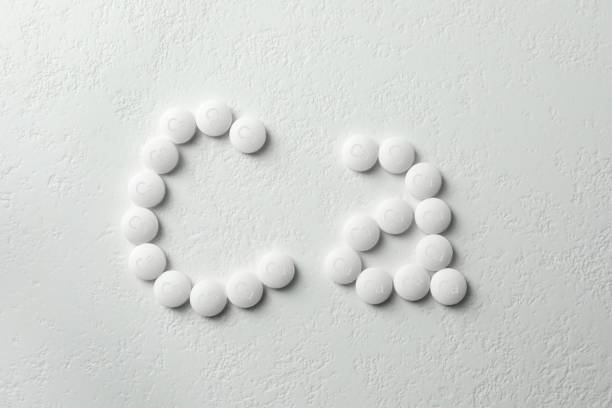 istock Flat lay composition with calcium supplement pills on white background 1459445873