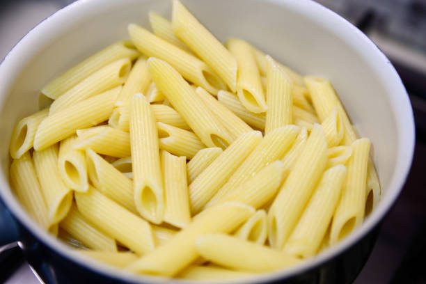 istock Fresh tasty pasta in pot, closeup view 1459446493