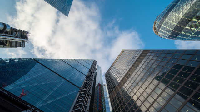 Skyscraper in London Financial district with clouds in the daytime - 4k time-lapse