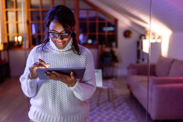 istock Woman working in home office in night 1459451568